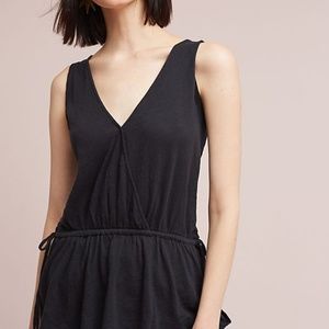 NWOT Black peplum side tie deep v-neck wrap top